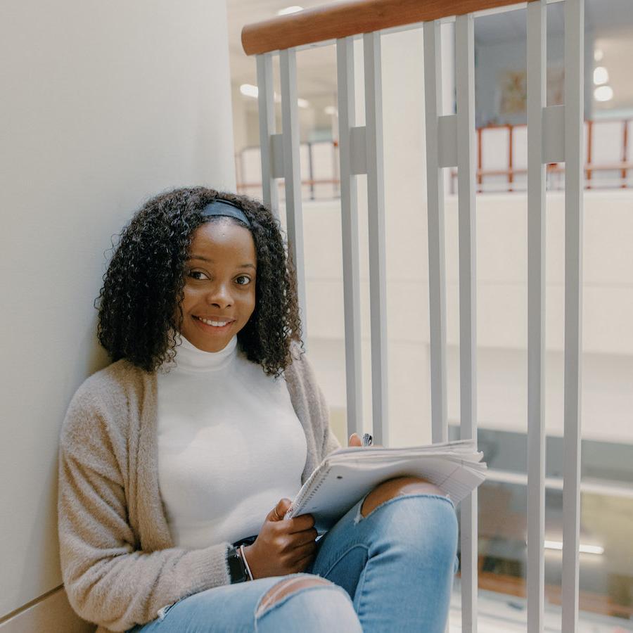 Female student sitting in campus center